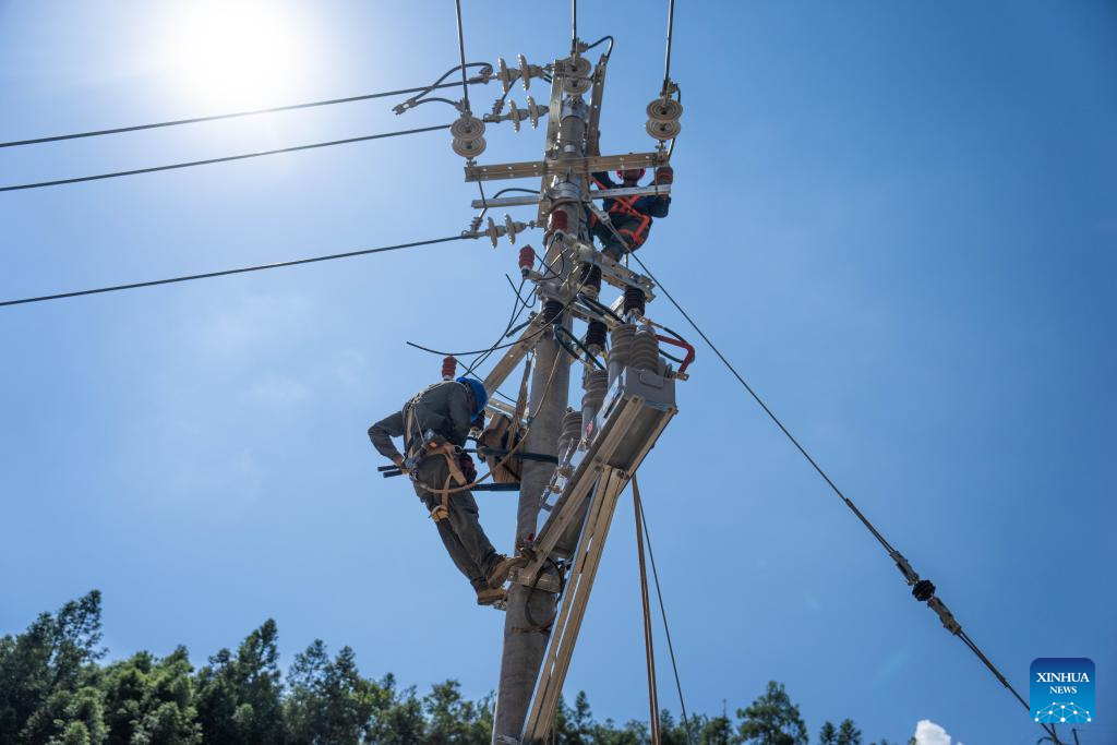 Communication, power supplies largely resume in flood-hit Chinese city