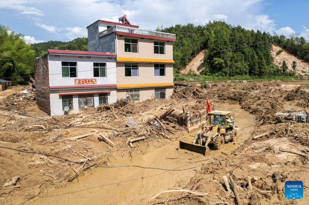 Communication, power supplies largely resume in flood-hit Chinese city