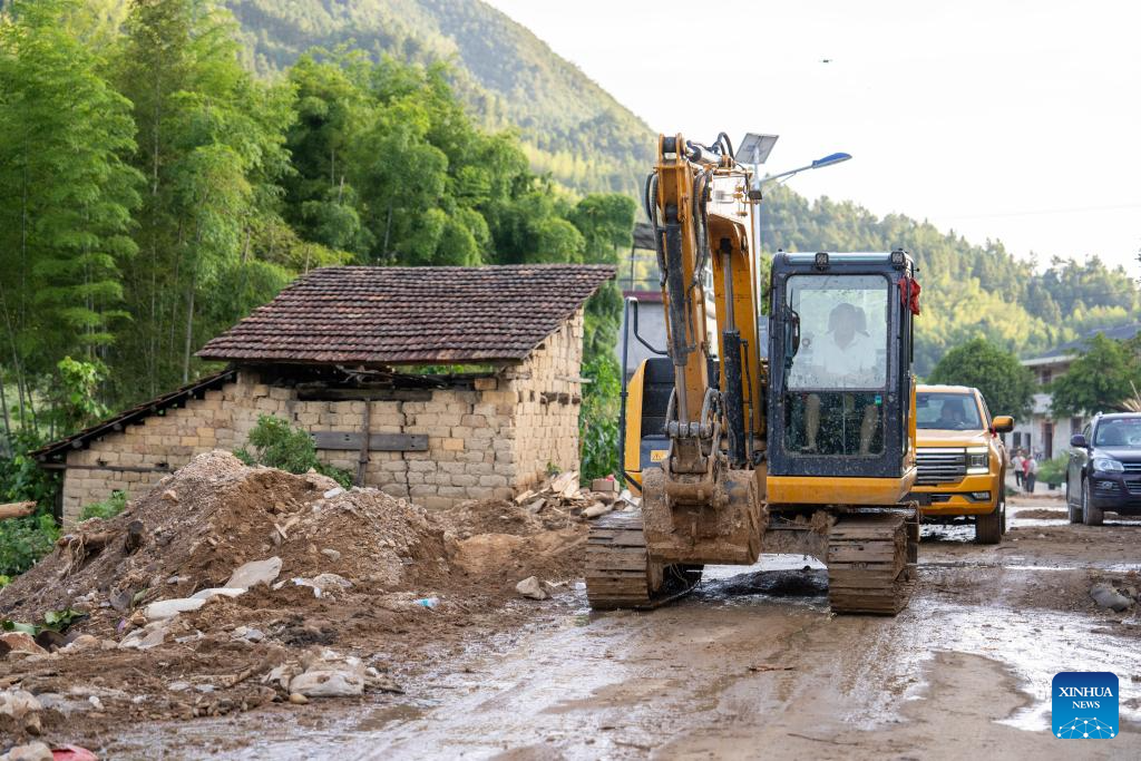 Communication, power supplies largely resume in flood-hit Chinese city