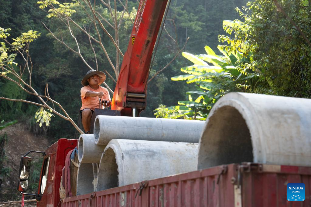 Communication, power supplies largely resume in flood-hit Chinese city