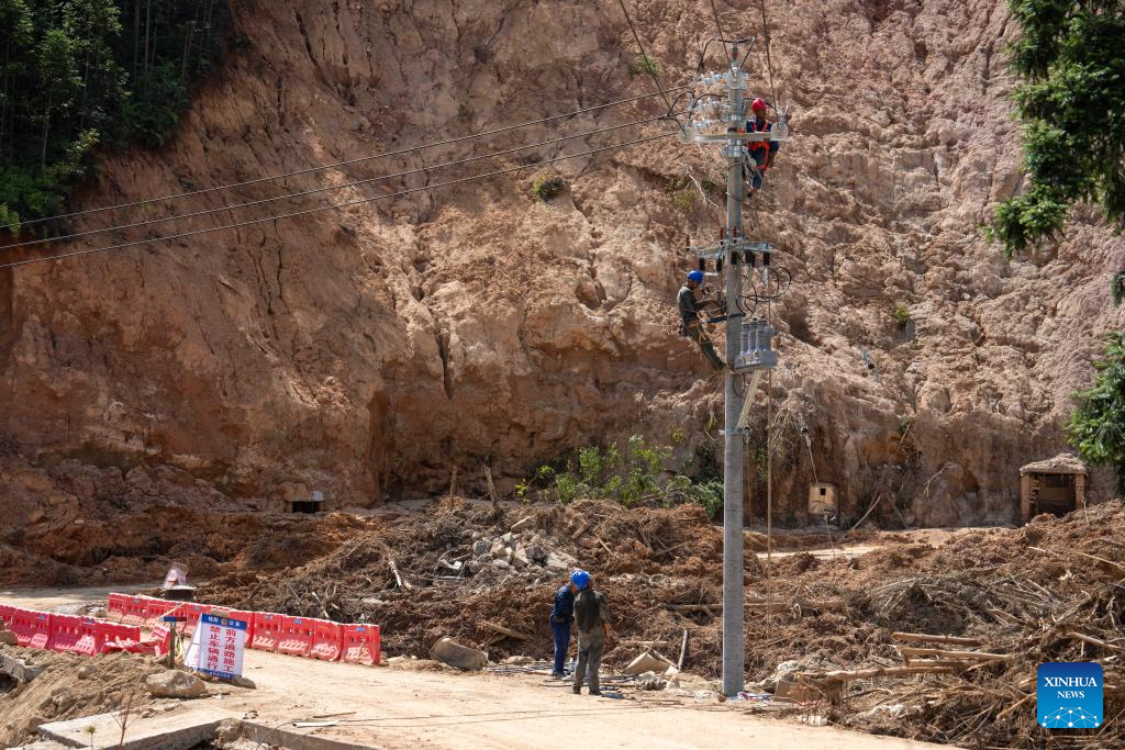 Communication, power supplies largely resume in flood-hit Chinese city