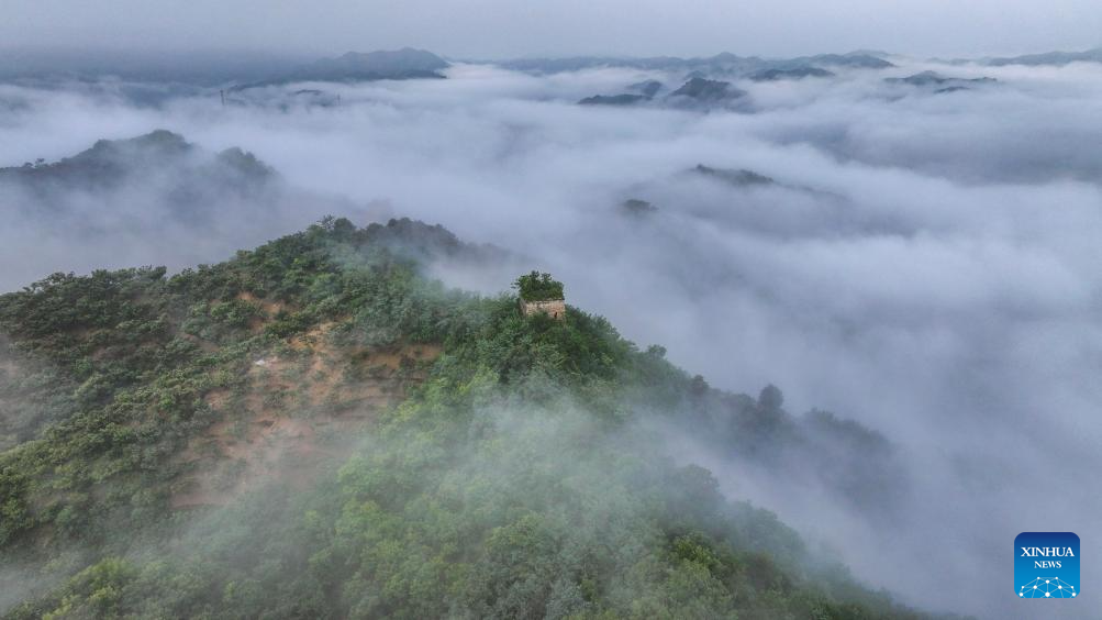 Scenery of Great Wall shrouded in clouds in Hebei