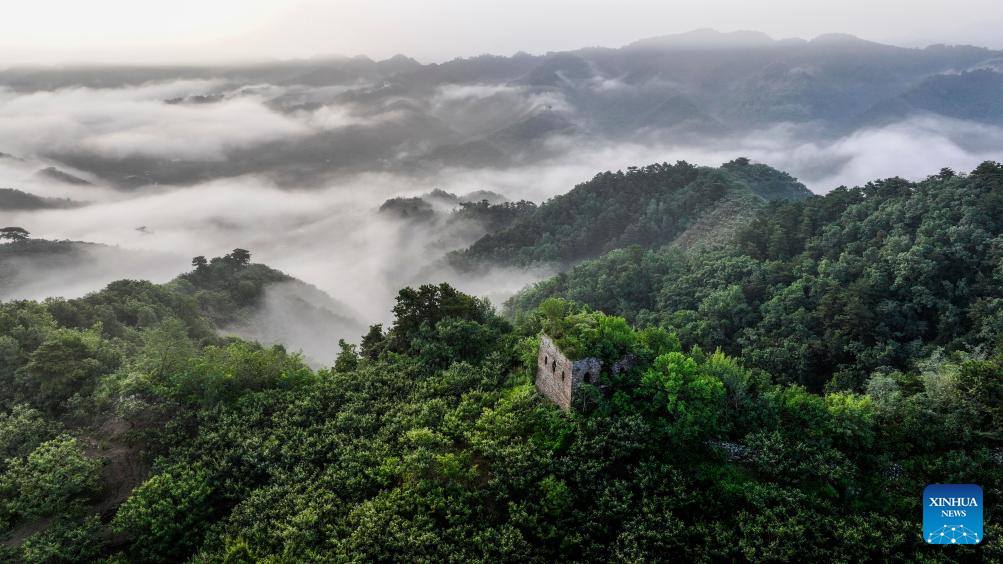 Scenery of Great Wall shrouded in clouds in Hebei