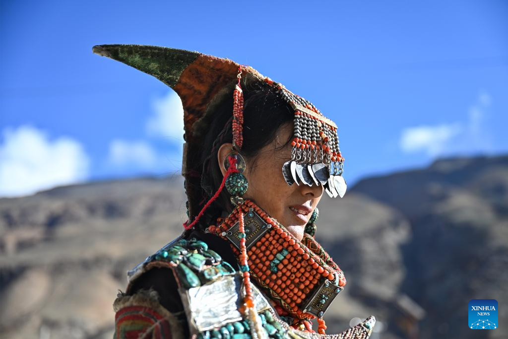 Villagers display folk costume in Pulan County, SW China's Xizang