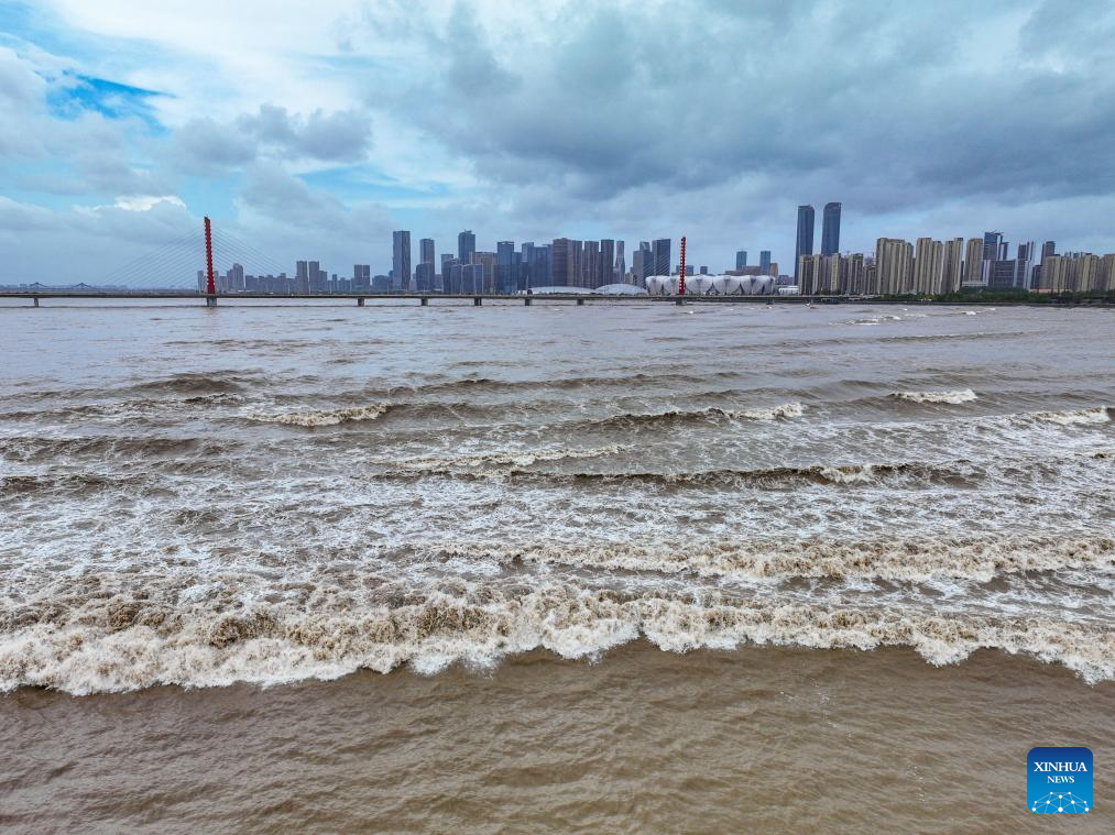 In pics: waves caused by the Qiantang River tidal bore in Hangzhou