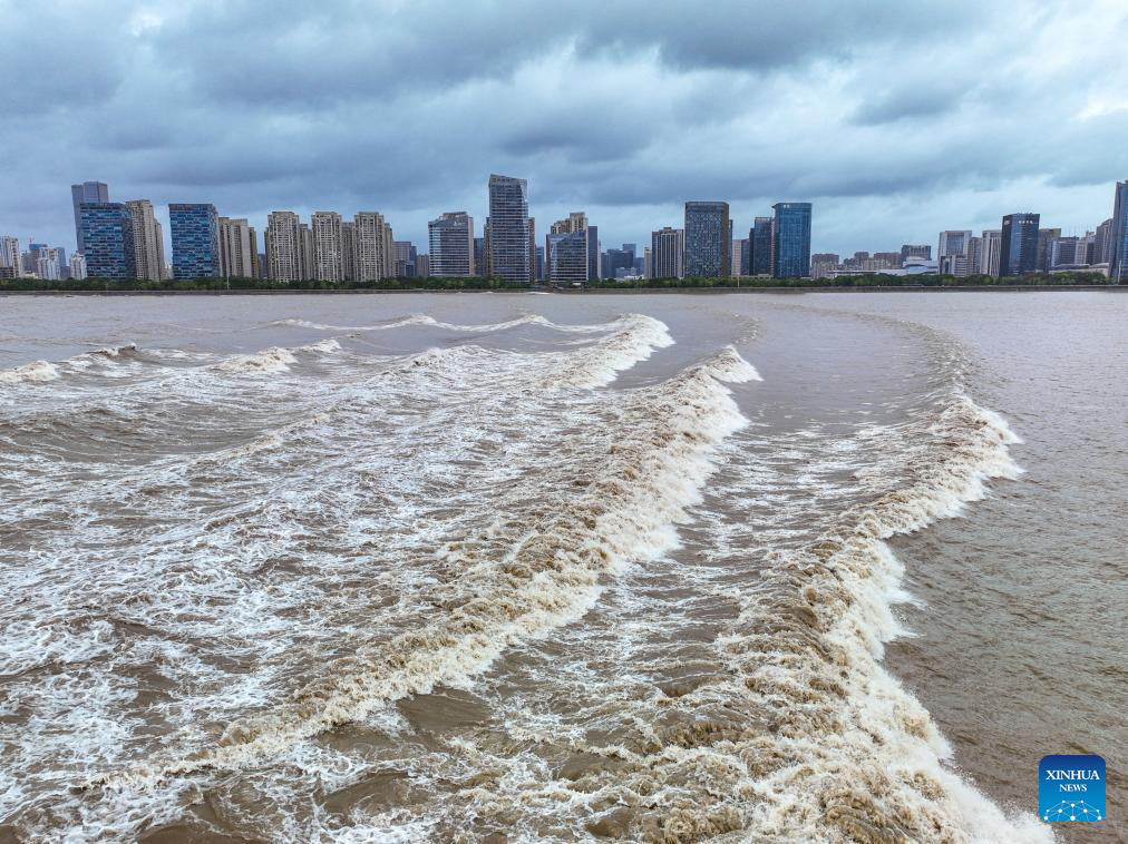 In pics: waves caused by the Qiantang River tidal bore in Hangzhou