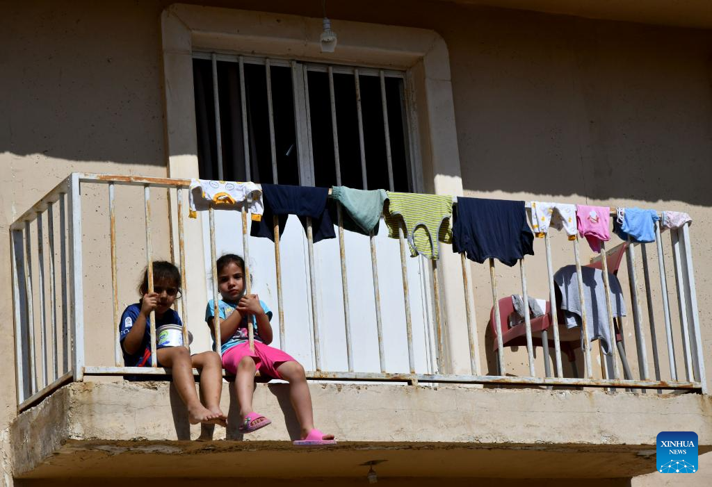 People fleeing from Lebanon seen at Harjalleh shelter center in Syria