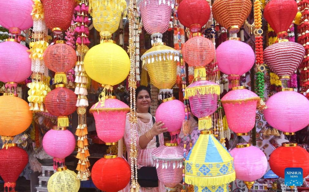 People shop before Diwali Festival in India