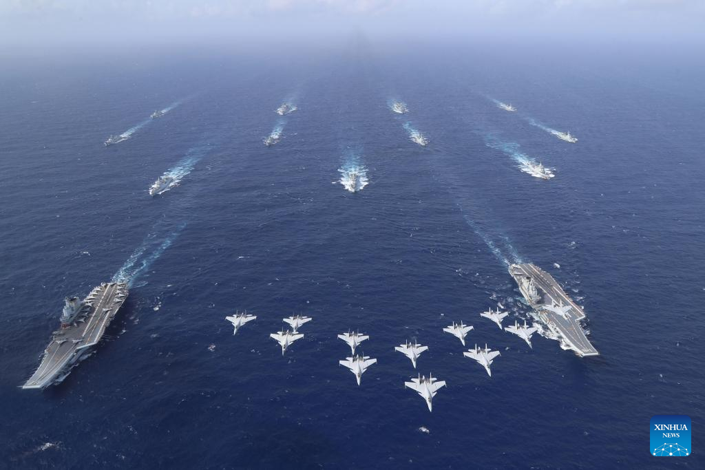 Chinese navy conducts dual aircraft carrier formation exercise for first time