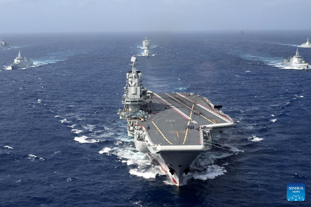 Chinese navy conducts dual aircraft carrier formation exercise for first time