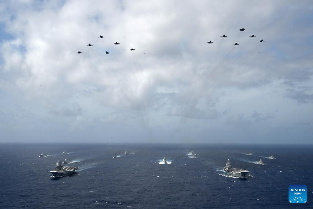 Chinese navy conducts dual aircraft carrier formation exercise for first time