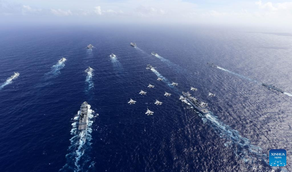 Chinese navy conducts dual aircraft carrier formation exercise for first time