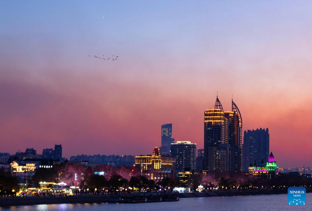 A conjunction of Venus and crescent moon observed in Harbin