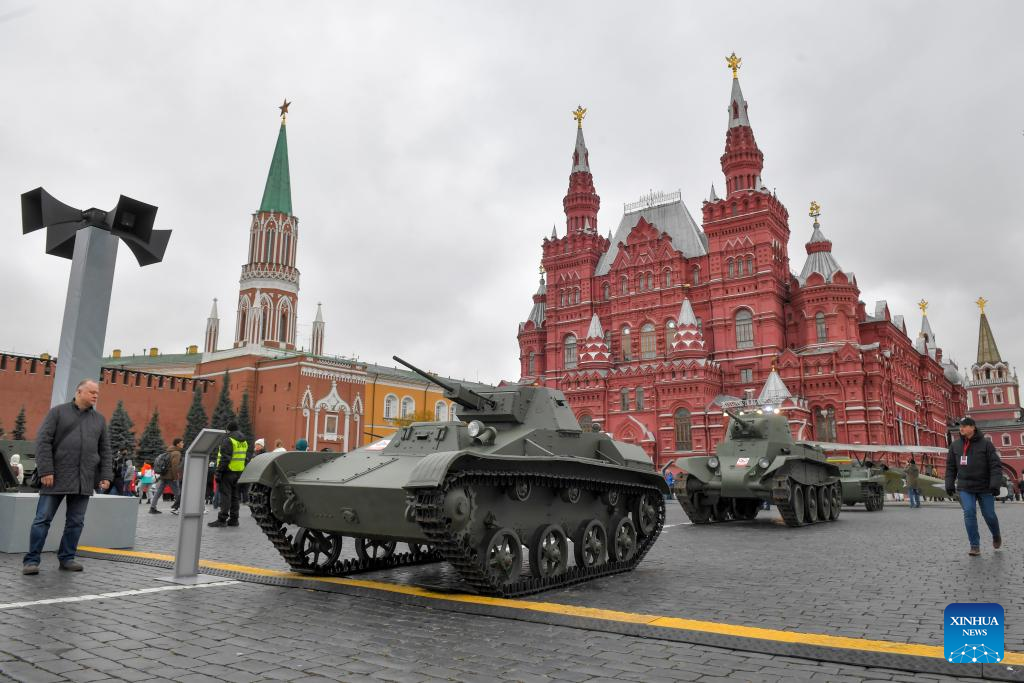 People visit outdoor exhibition commemorating military parade in 1941 in Moscow