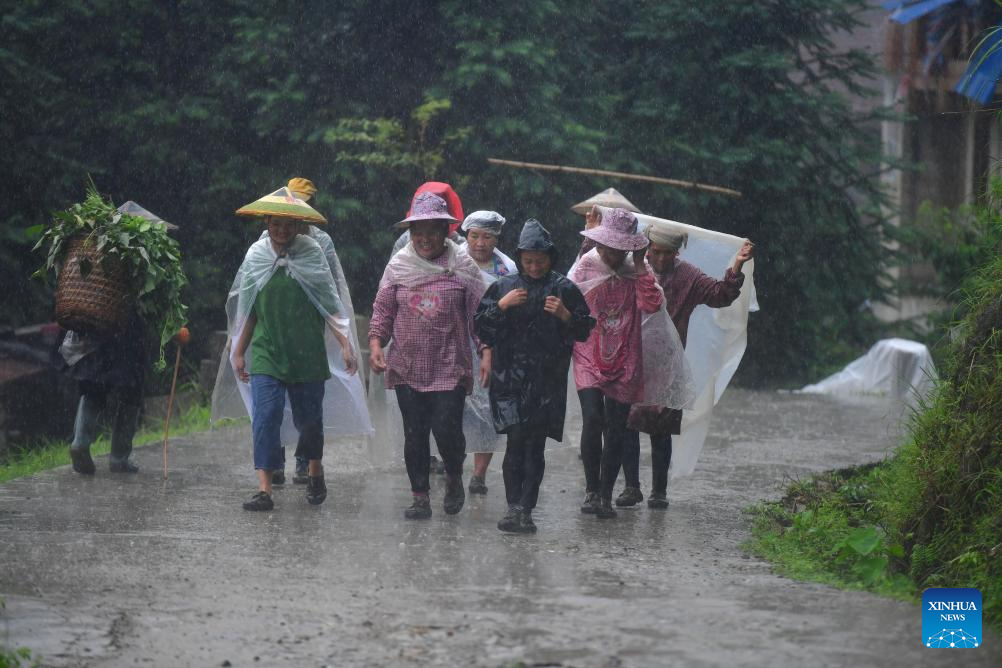 A glimpse of life in rainy days in Wuying Village, S China