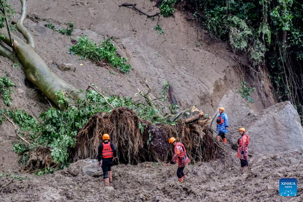 Landslides in Indonesia's North Sumatra leave at least 7 dead, 7 missing