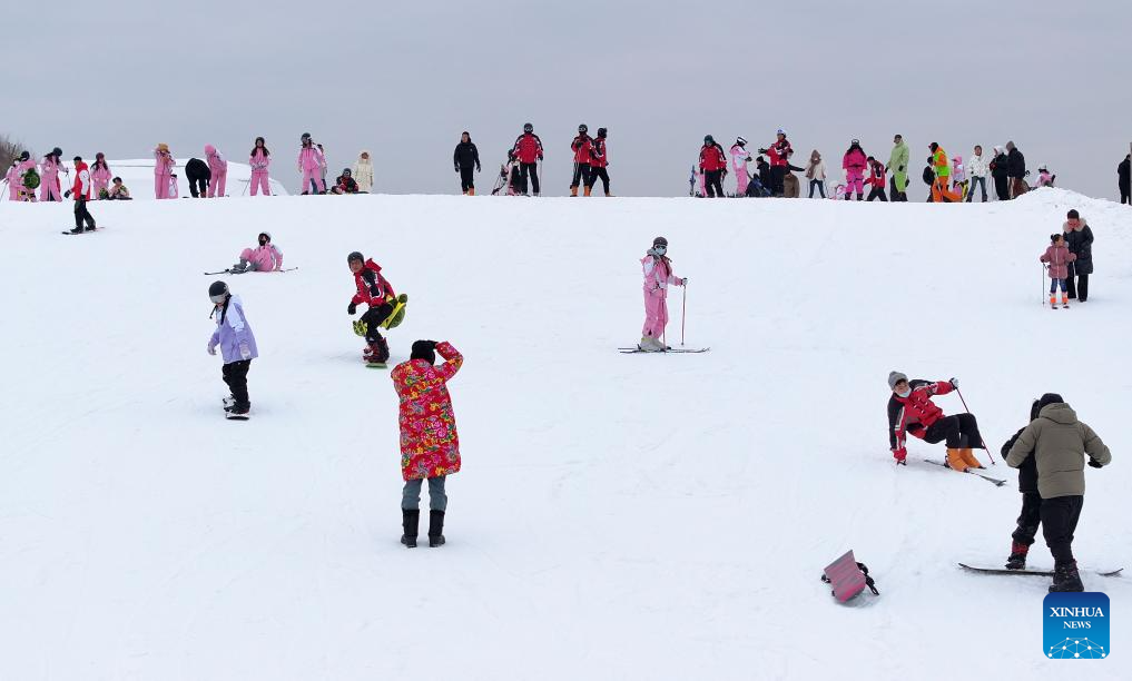 Tourists ski at Yuehai Ski Resort in Yinchuan, China's Ningxia