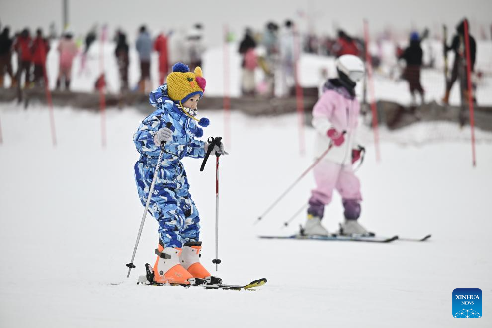 Tourists ski at Yuehai Ski Resort in Yinchuan, China's Ningxia