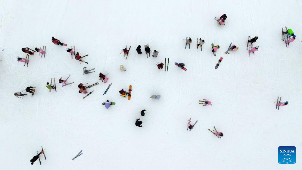 Tourists ski at Yuehai Ski Resort in Yinchuan, China's Ningxia