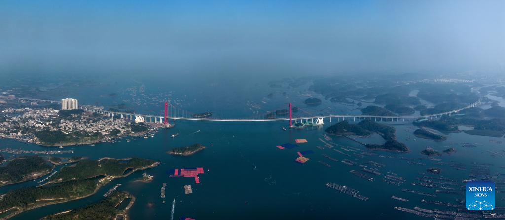 Longest cross-sea bridge in China's Guangxi opens to traffic