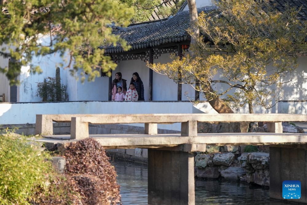 Tourists visit Humble Administrator's Garden in Suzhou, E China