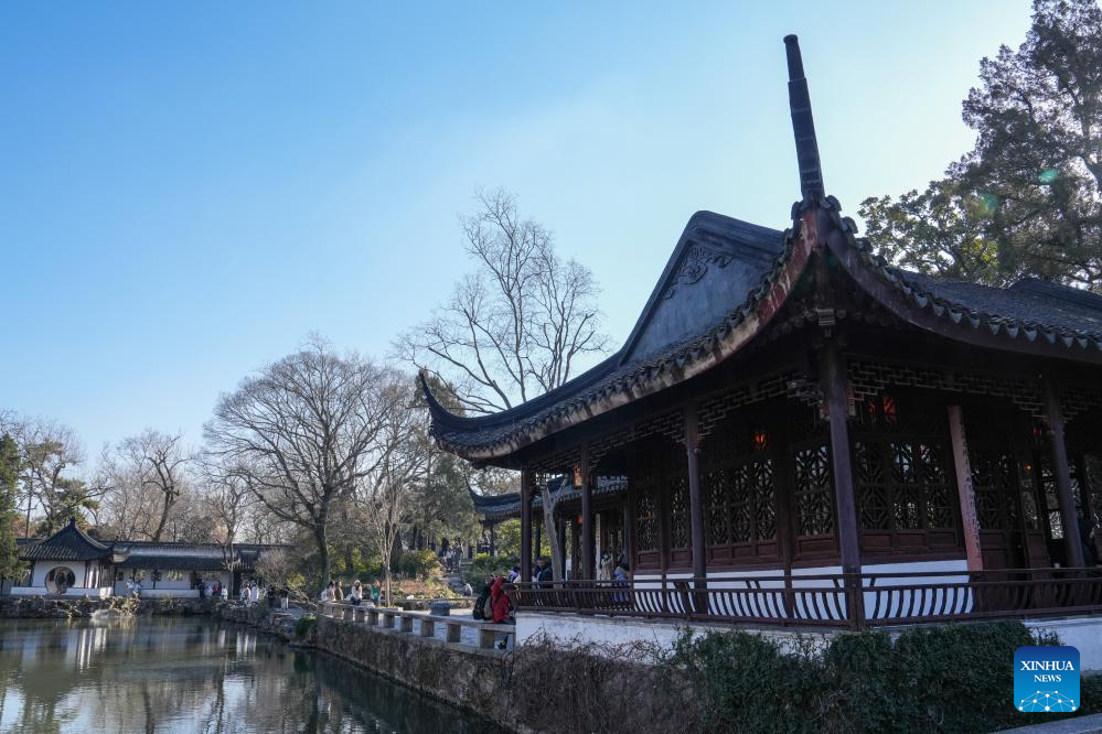 Tourists visit Humble Administrator's Garden in Suzhou, E China