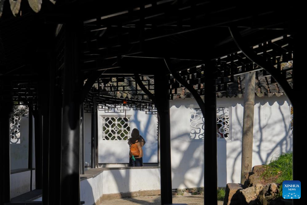 Tourists visit Humble Administrator's Garden in Suzhou, E China