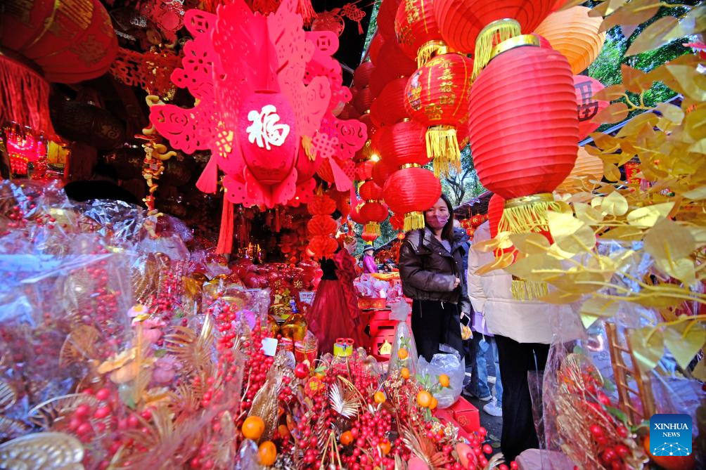 People prepare for Chinese Lunar New Year in Guangxi