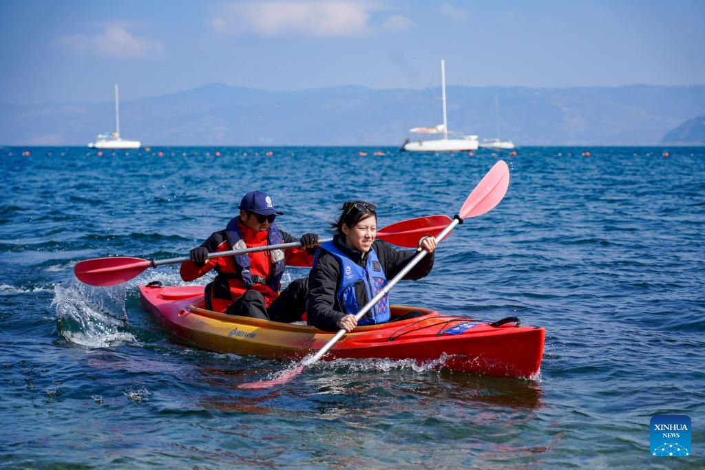 Tourists enjoy themselves In Yunnan