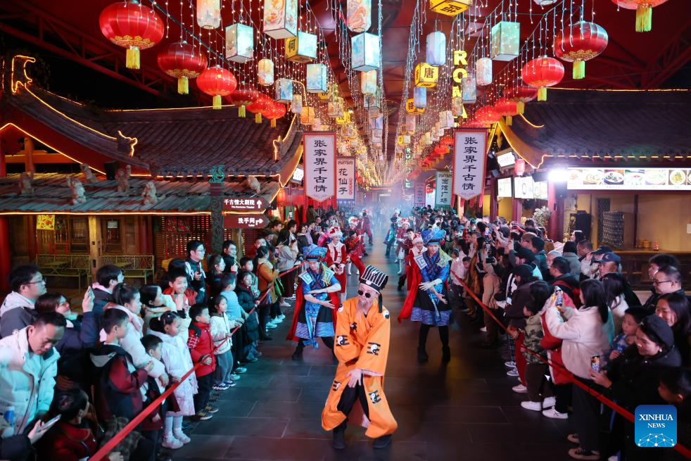 People immerse themselves in traditional customs and partake in festivities before Spring Festival across China