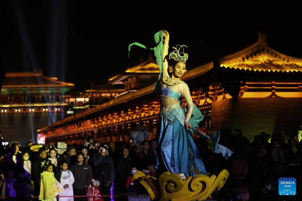 People immerse themselves in traditional customs and partake in festivities before Spring Festival across China