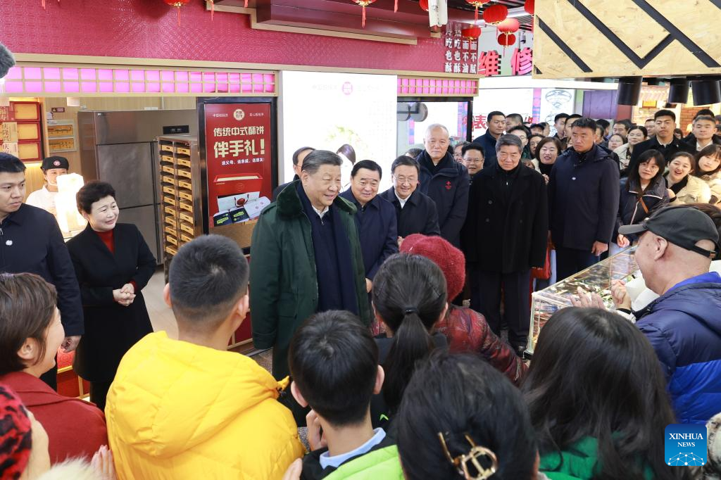 Xi inspects Spring Festival market supply