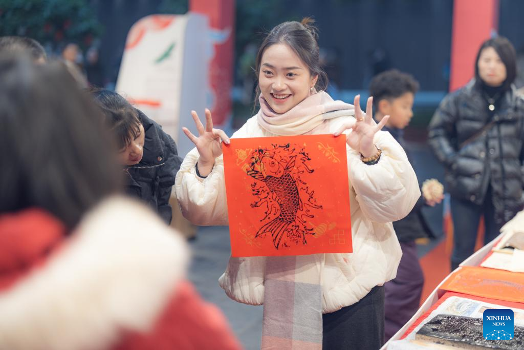 In pics: Inheritor of Liangping New Year Woodblock Prints in SW China's Chongqing