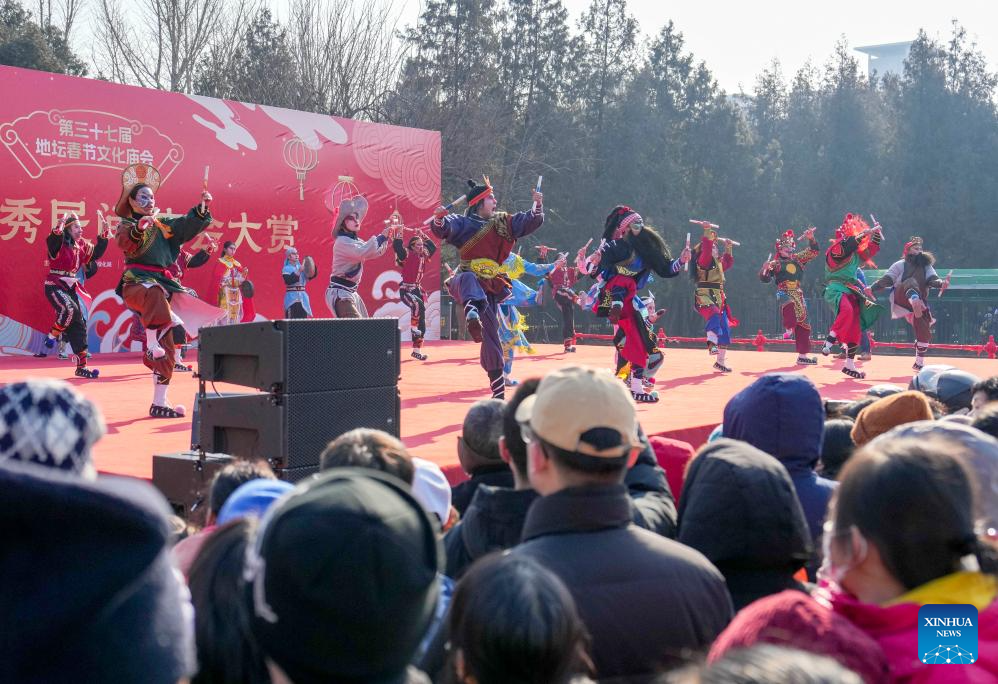 People visit Spring Festival temple fair at Ditan Park in Beijing