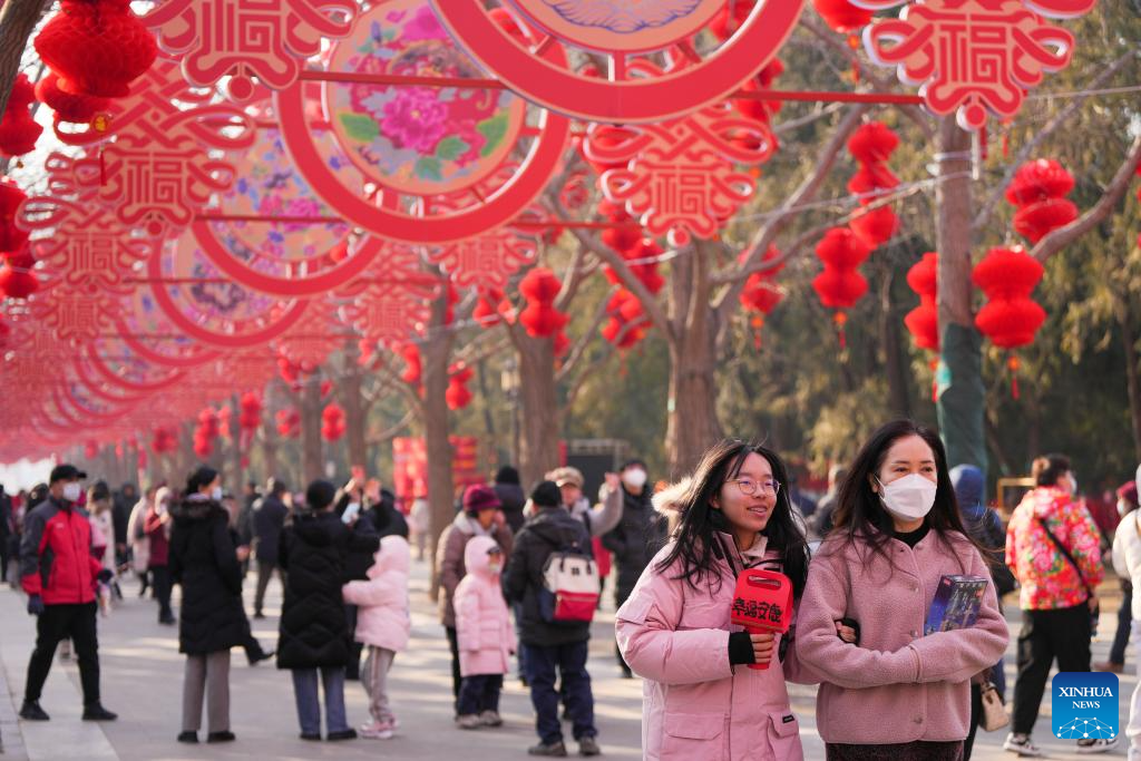 People visit Spring Festival temple fair at Ditan Park in Beijing