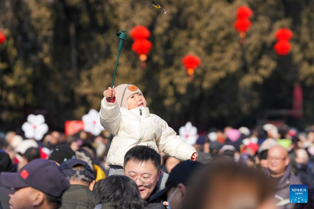 People visit Spring Festival temple fair at Ditan Park in Beijing