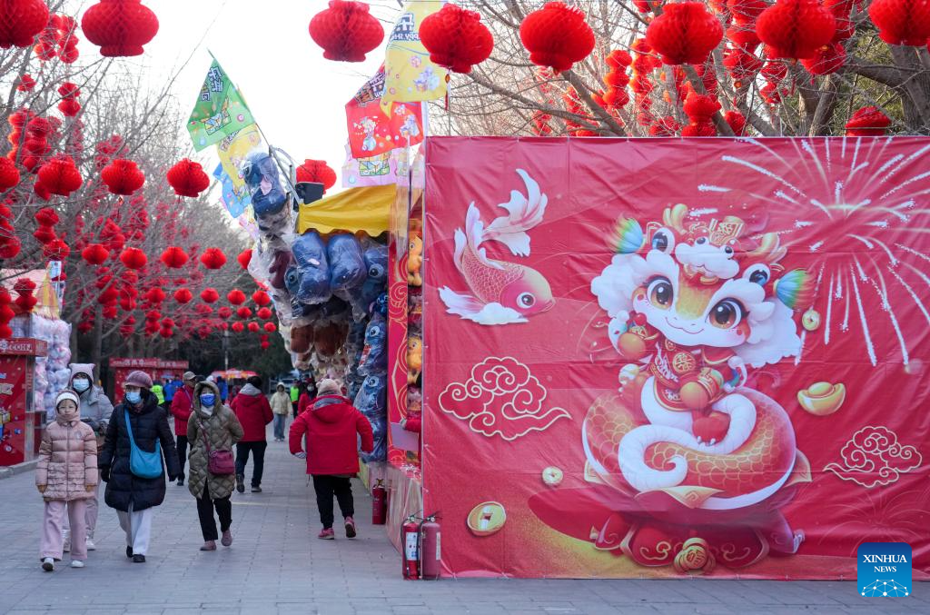 People visit Spring Festival temple fair at Ditan Park in Beijing