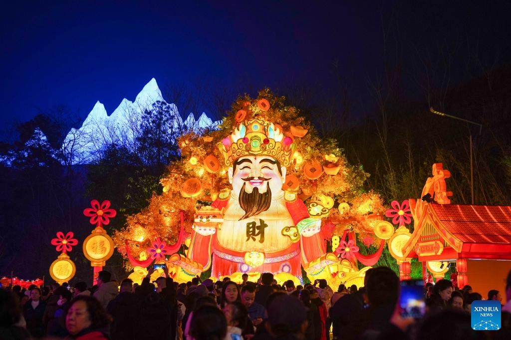 Tourists visit 31st Zigong Int'l Dinosaur Lantern Show in Zigong, China's Sichuan