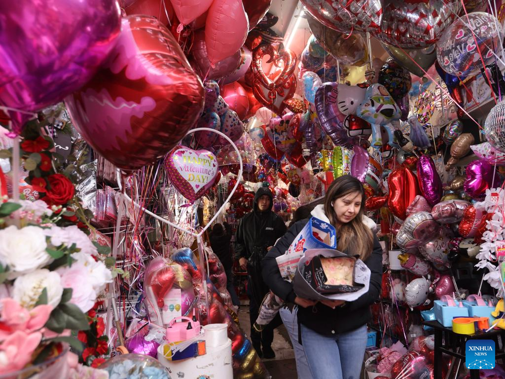 People prepare for Valentine's Day across world