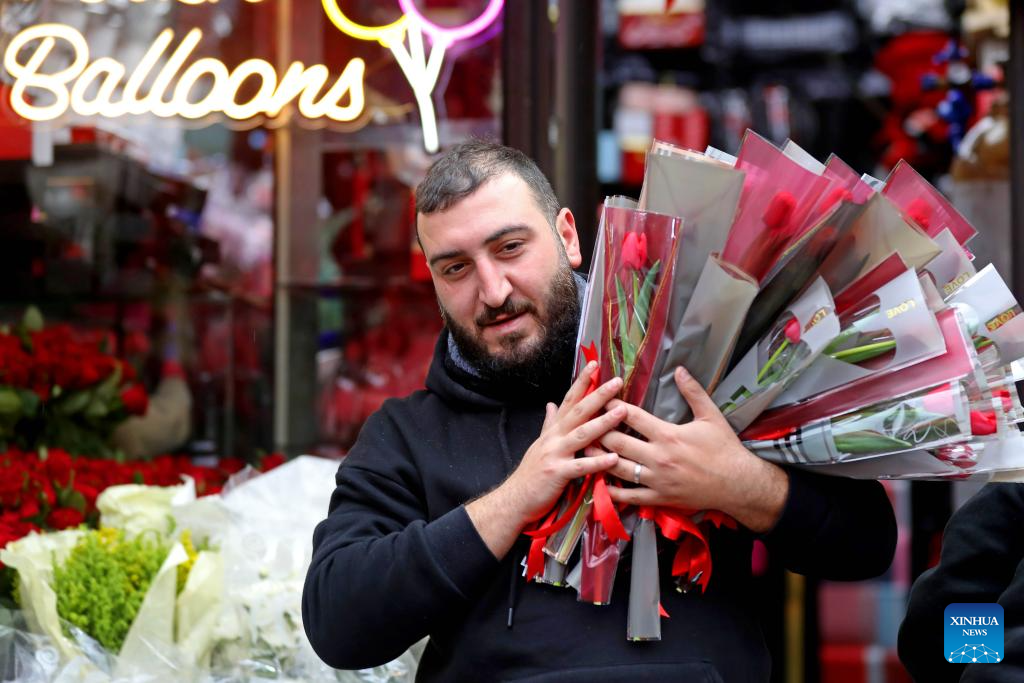 People prepare for Valentine's Day across world