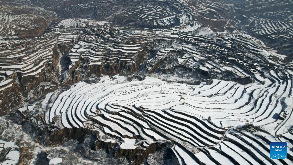 Snow scenery of terraced fields in China's Gansu