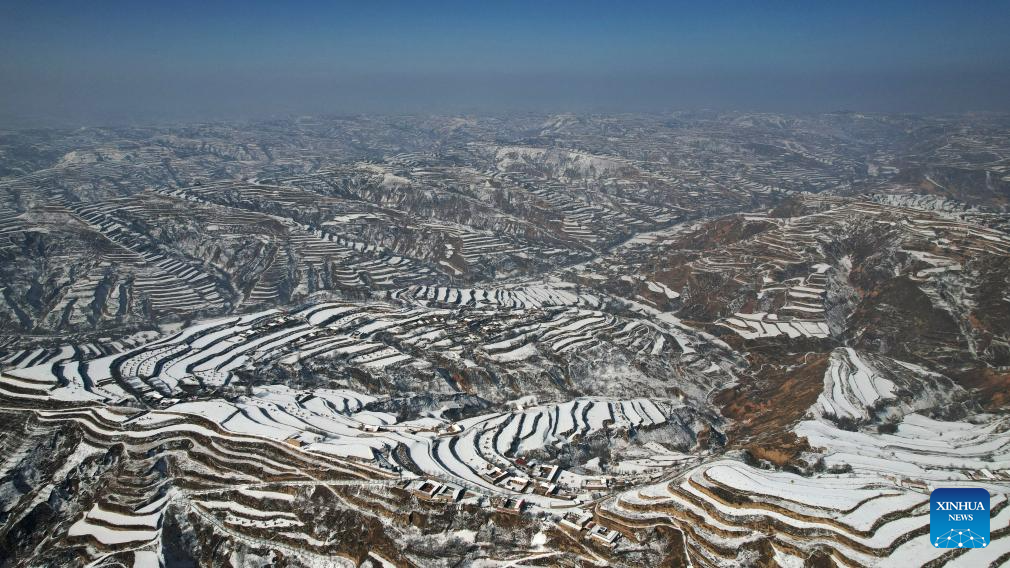 Snow scenery of terraced fields in China's Gansu