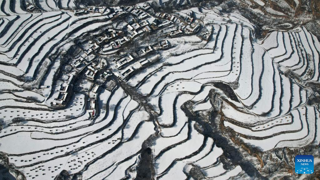 Snow scenery of terraced fields in China's Gansu