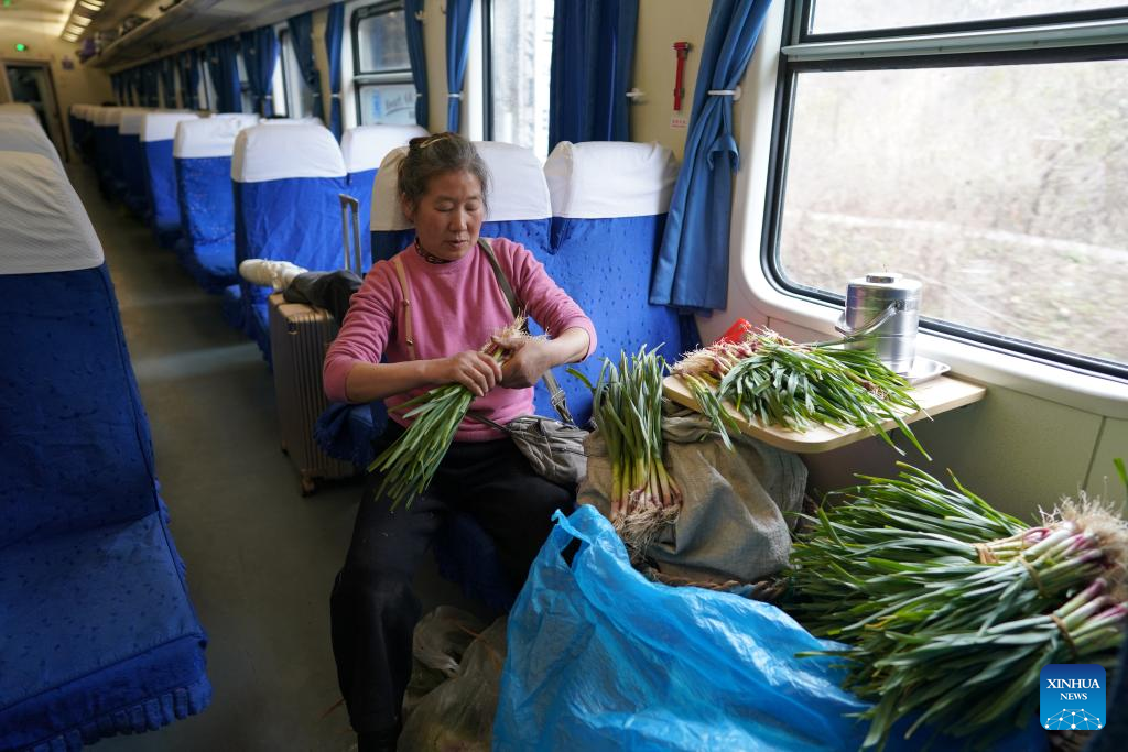 Across China: Slow train speeds up rural revitalization in China