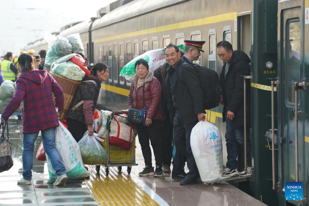 Across China: Slow train speeds up rural revitalization in China