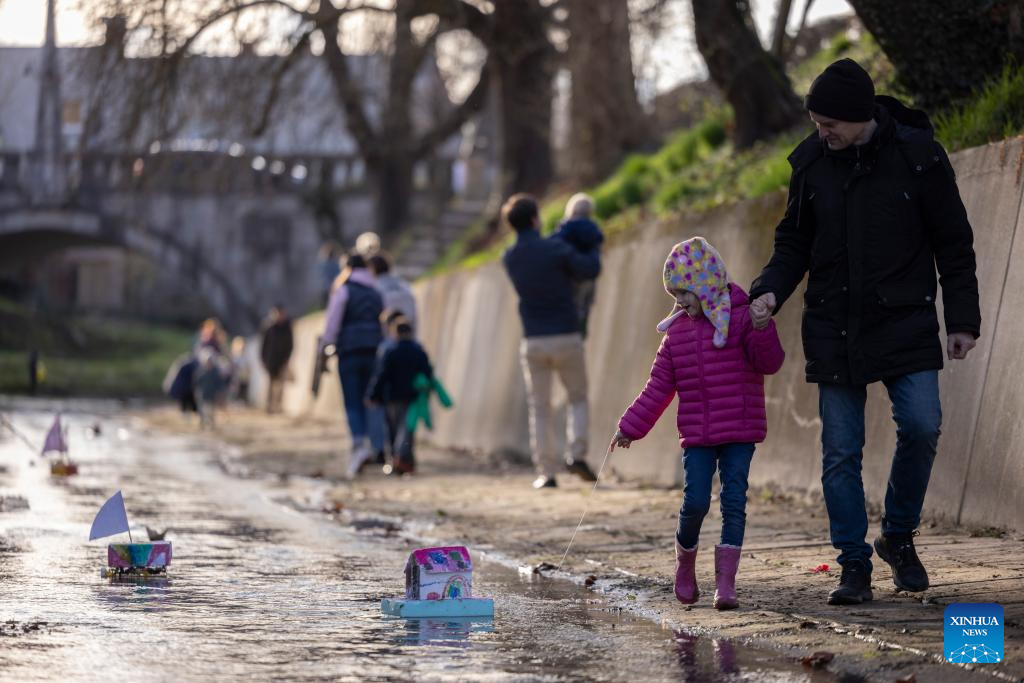 People celebrate arrival of spring in Ljubljana, Slovenia