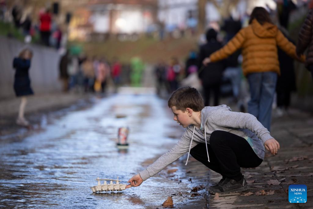 People celebrate arrival of spring in Ljubljana, Slovenia