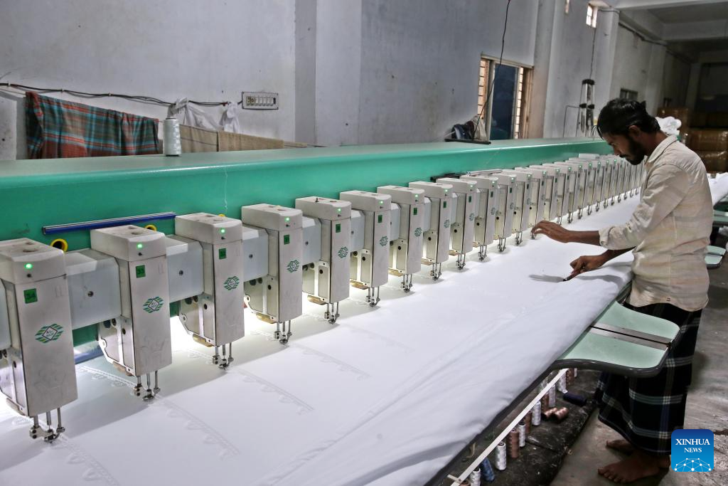 Workers produce prayer caps before Eid-ul-Fitr in Bangladesh