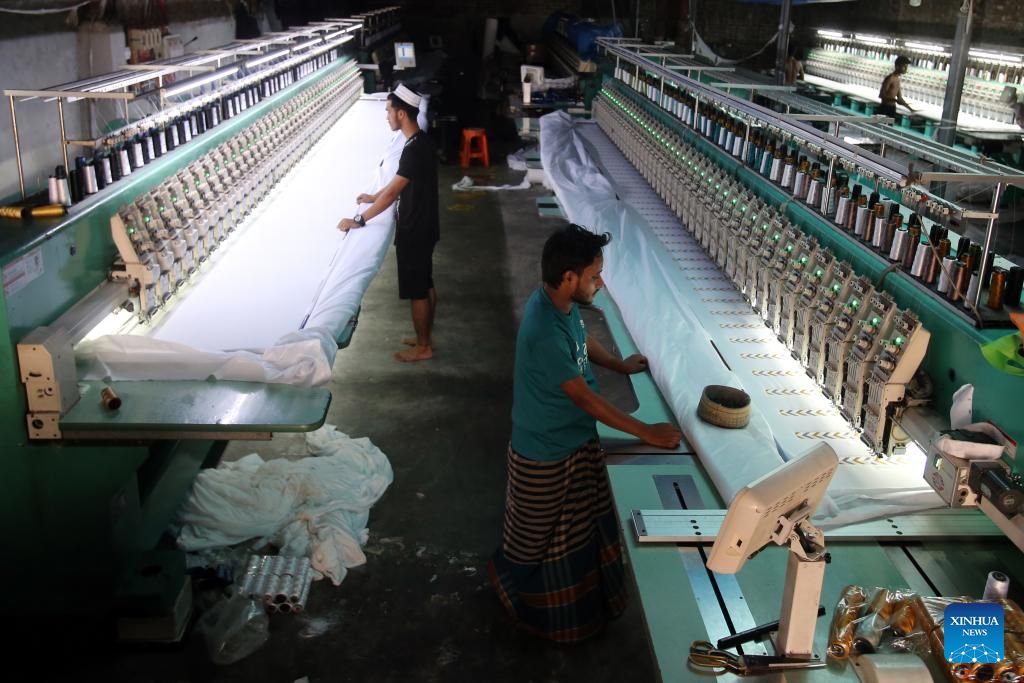 Workers produce prayer caps before Eid-ul-Fitr in Bangladesh