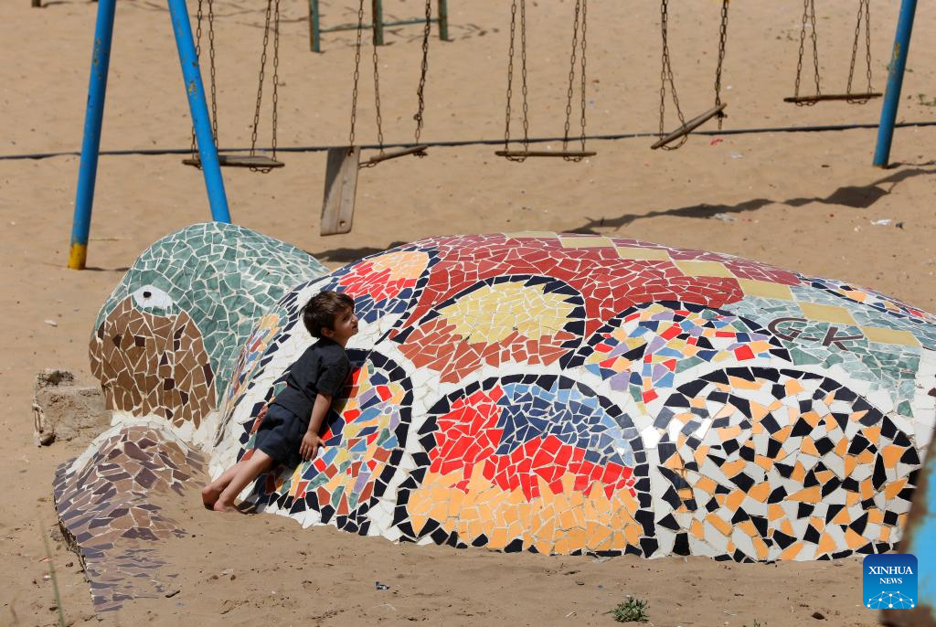 People enjoy themselves on beach in Beirut, Lebanon